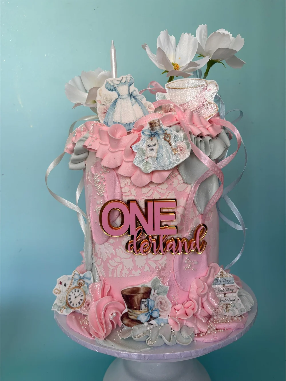 Tea party first birthday cake for Onederland